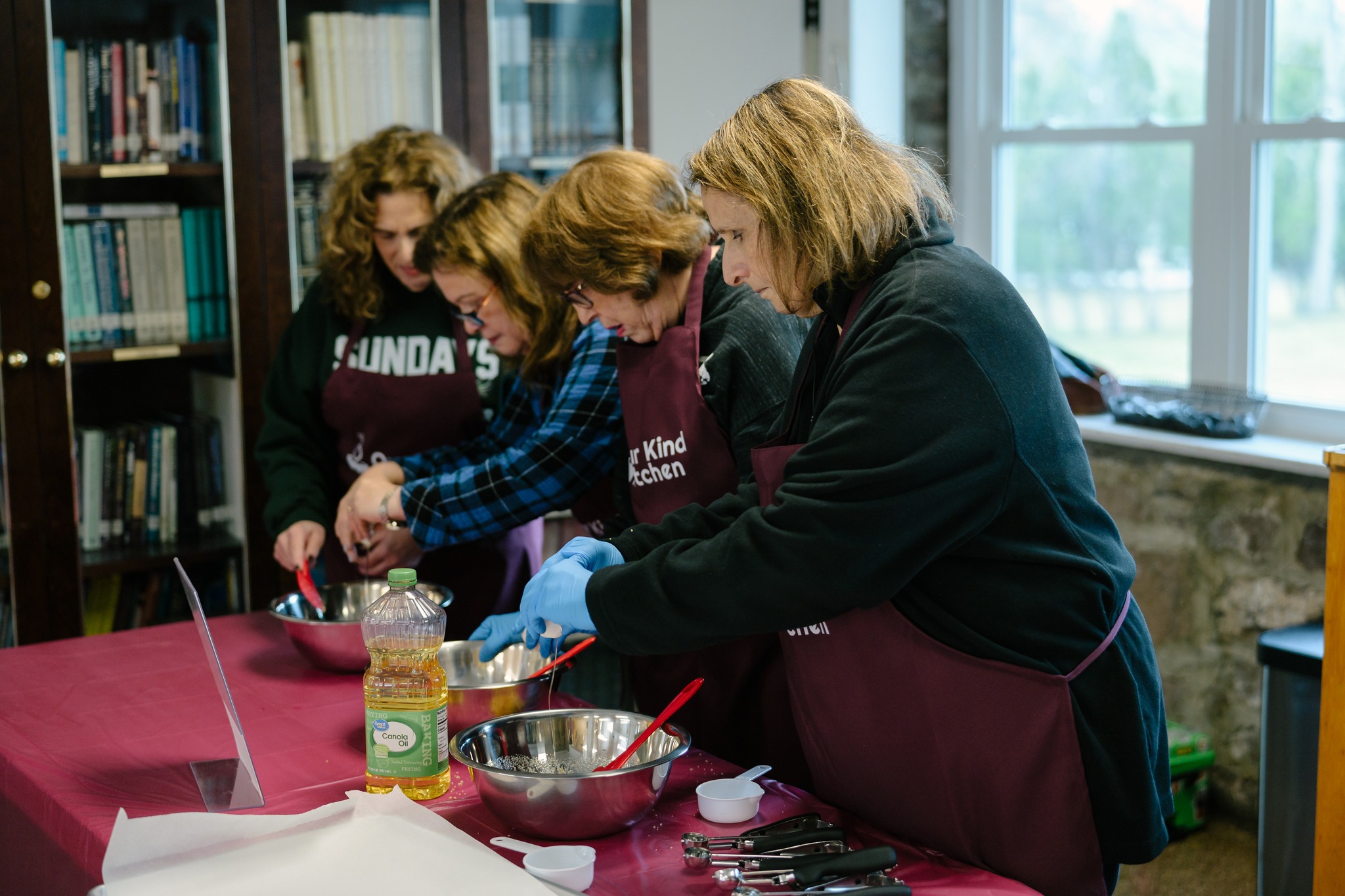 Volunteer chopping carrots